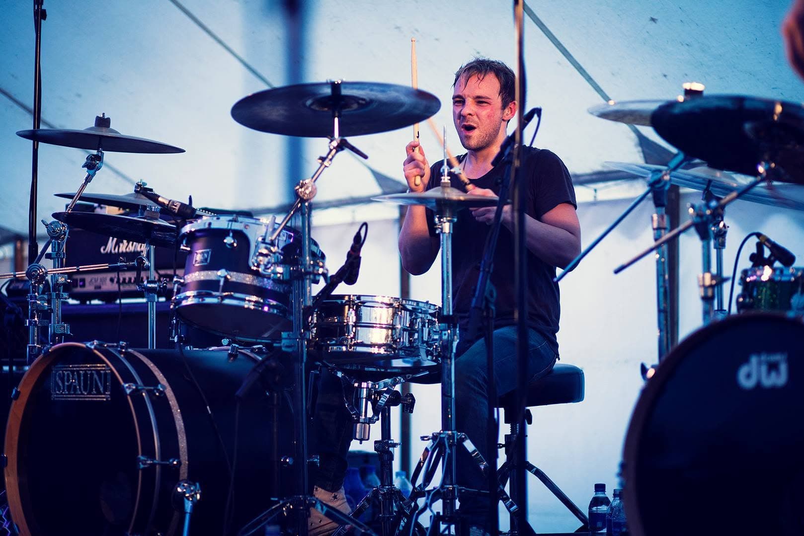 Jon Finnigan performing live behind his drum kit